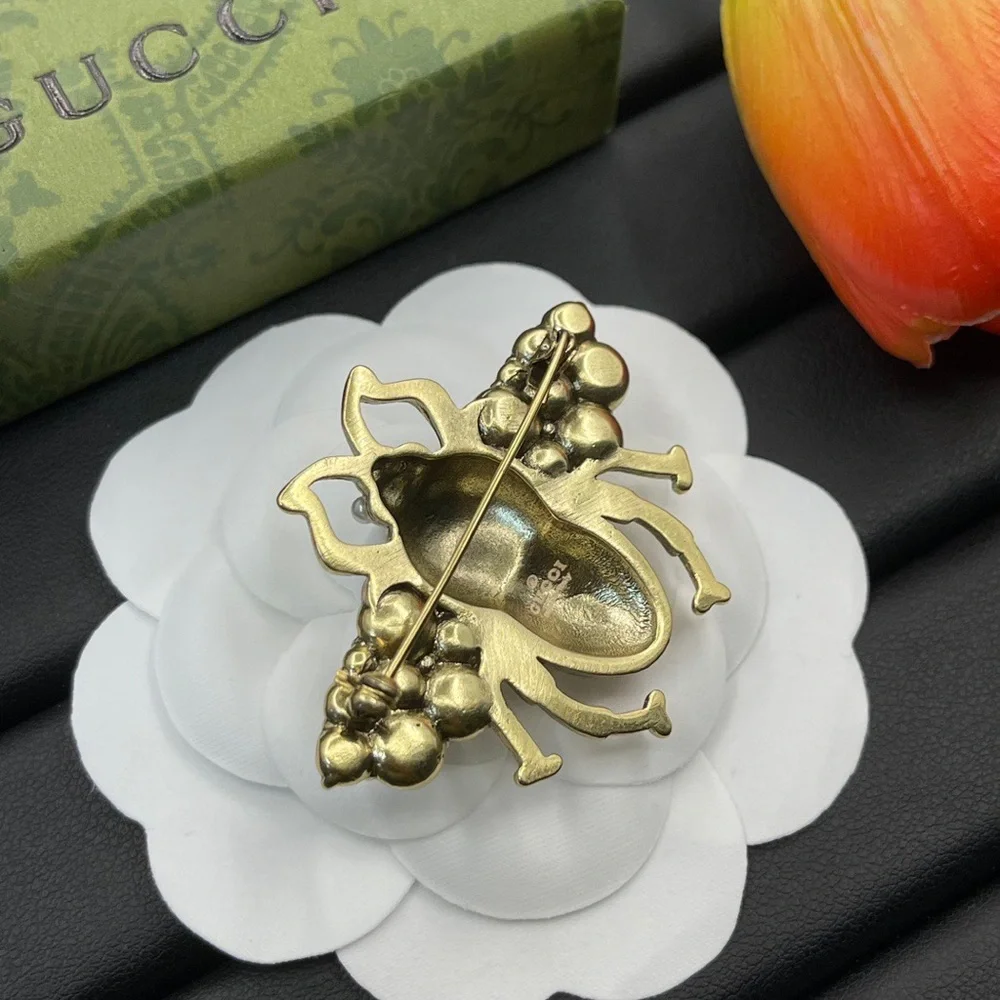 Gucci Gold-Tone Bee Brooch with Pearls and Red & Blue Enamel